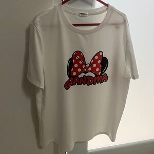 White Shirt with Red Bow Design